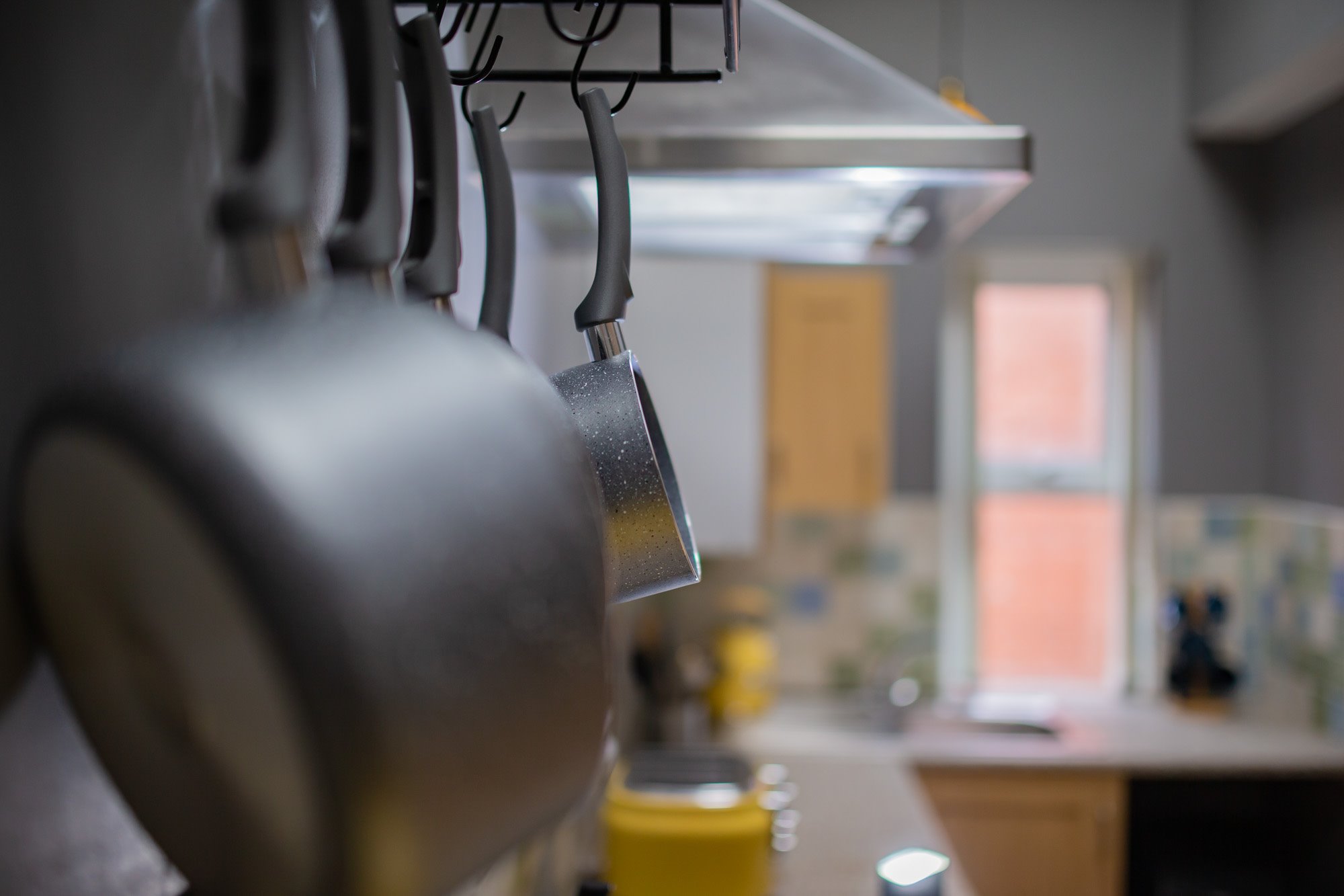 Kitchen utensils and counter in soft focus