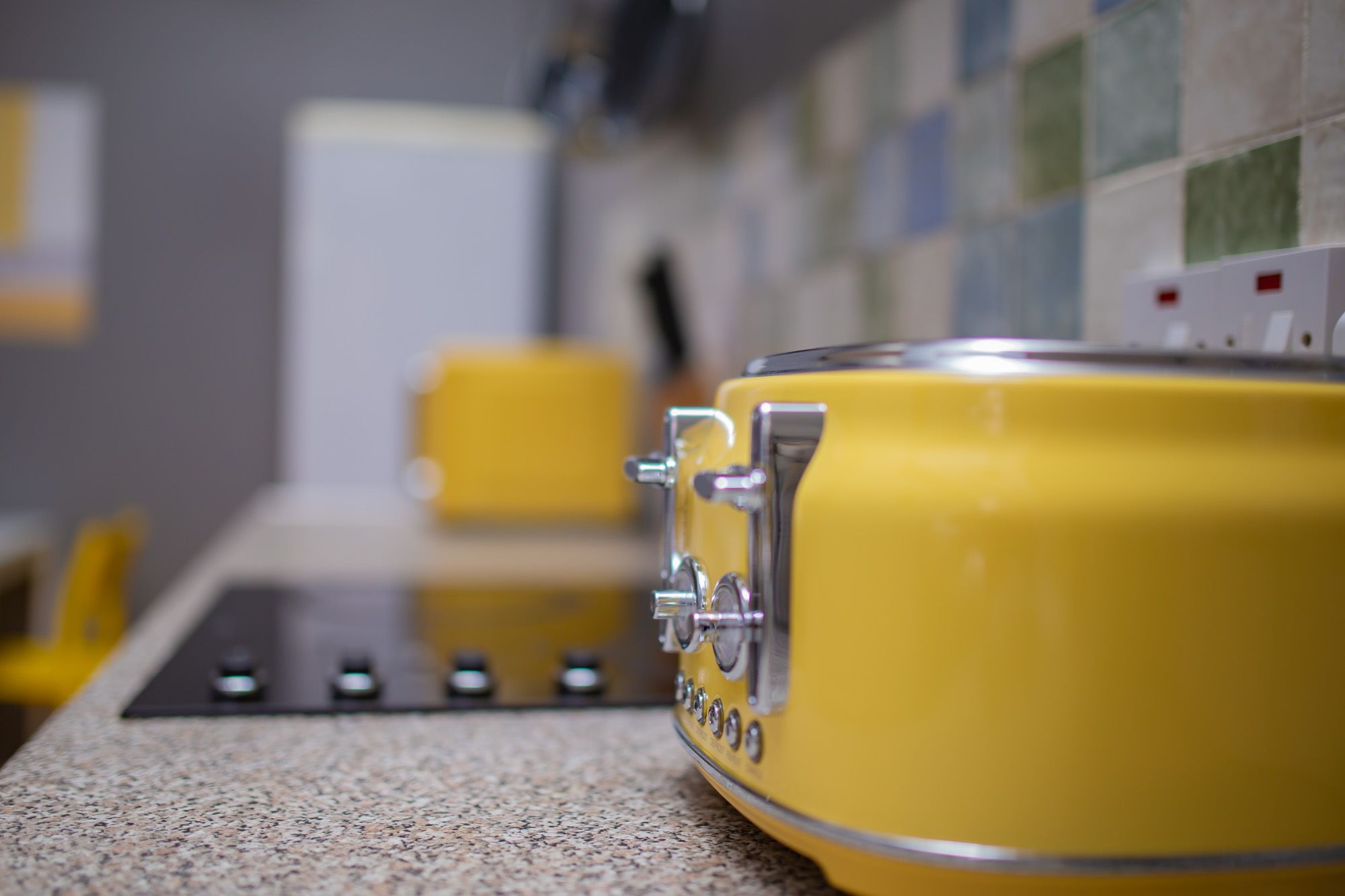 Yellow toaster on the kitchen counter