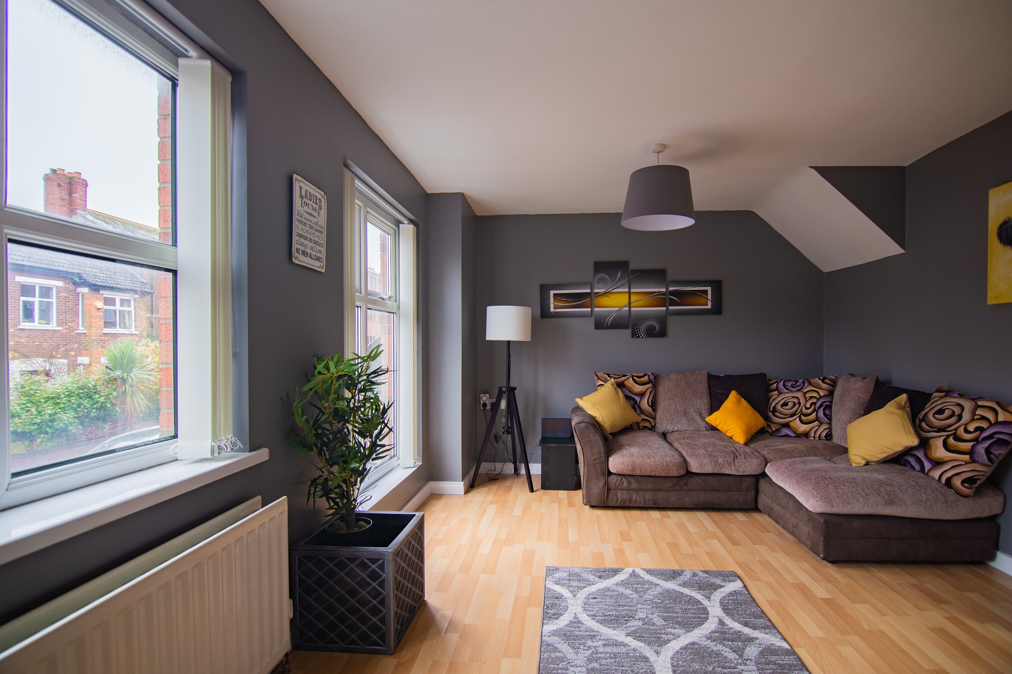 Lounge with windows and corner sofa
