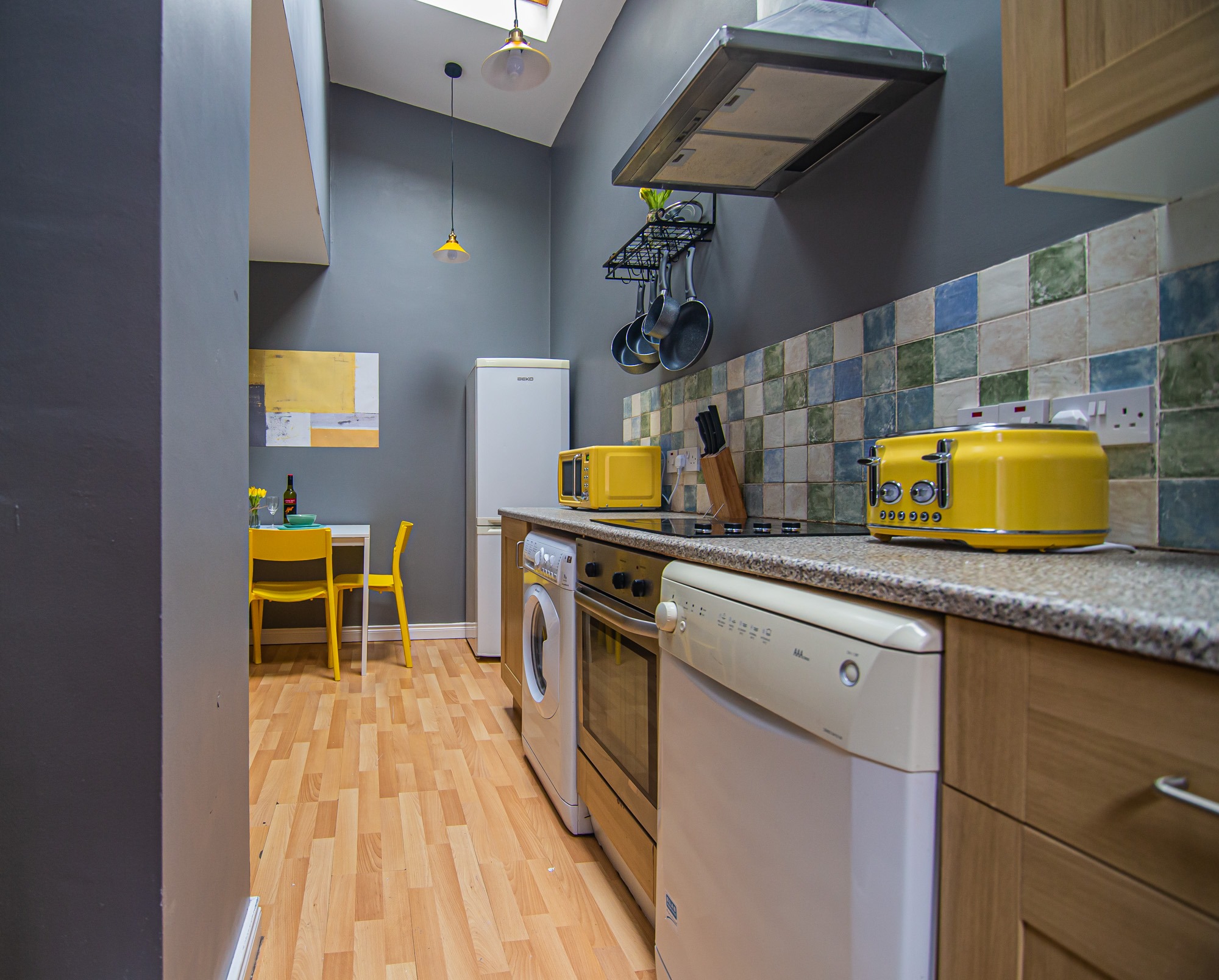 Fully equipped kitchen with cooker and washing machine